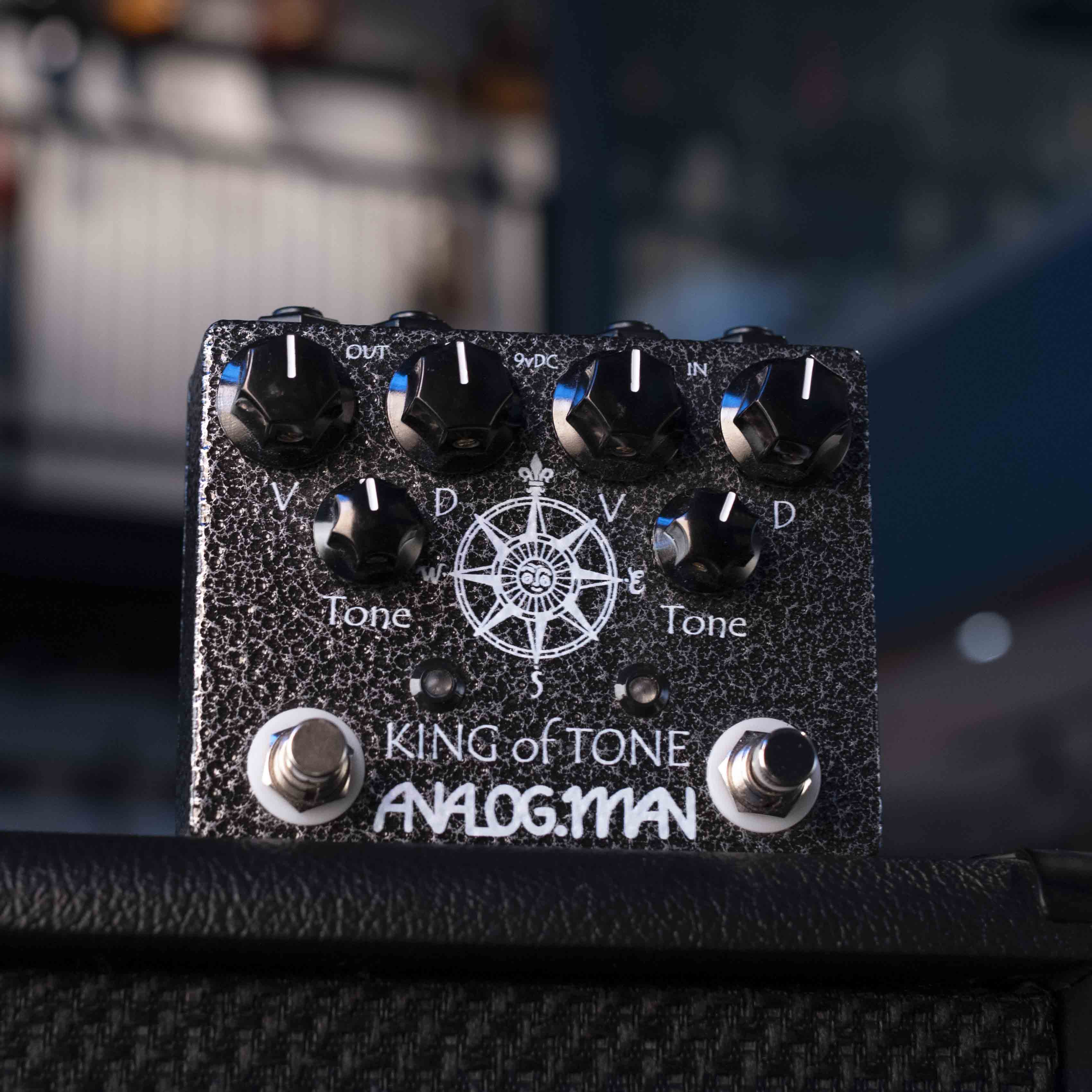 Black Analog Man King of Tone pedal with multiple knobs, two footswitches, and various input/output jacks.