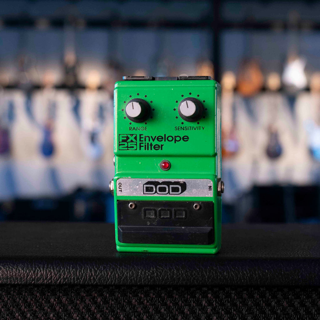 Green DOD FX 25 Envelope Filter guitar effects pedal with two control knobs and input/output jacks
