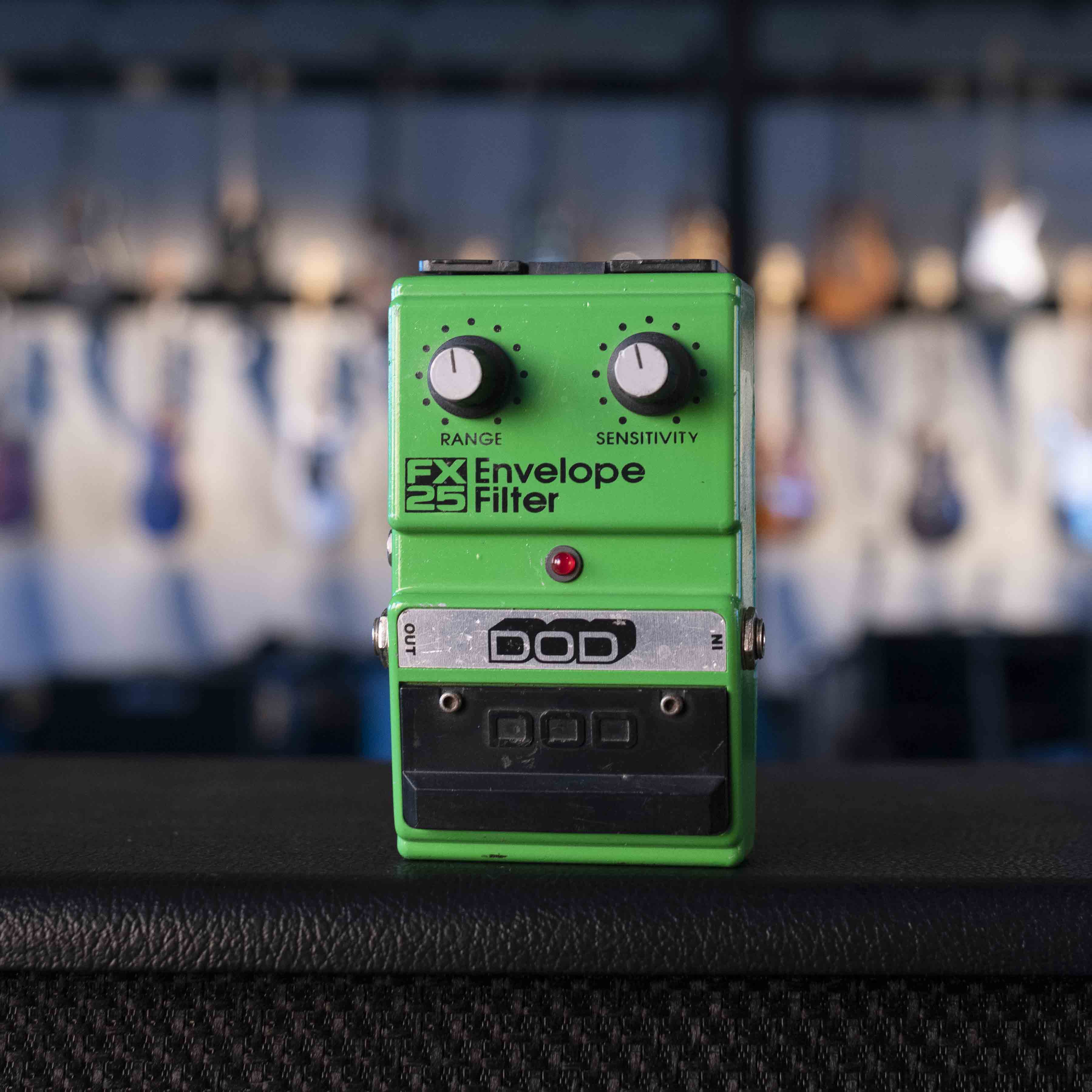 Green DOD FX 25 Envelope Filter guitar effects pedal with two control knobs and input/output jacks