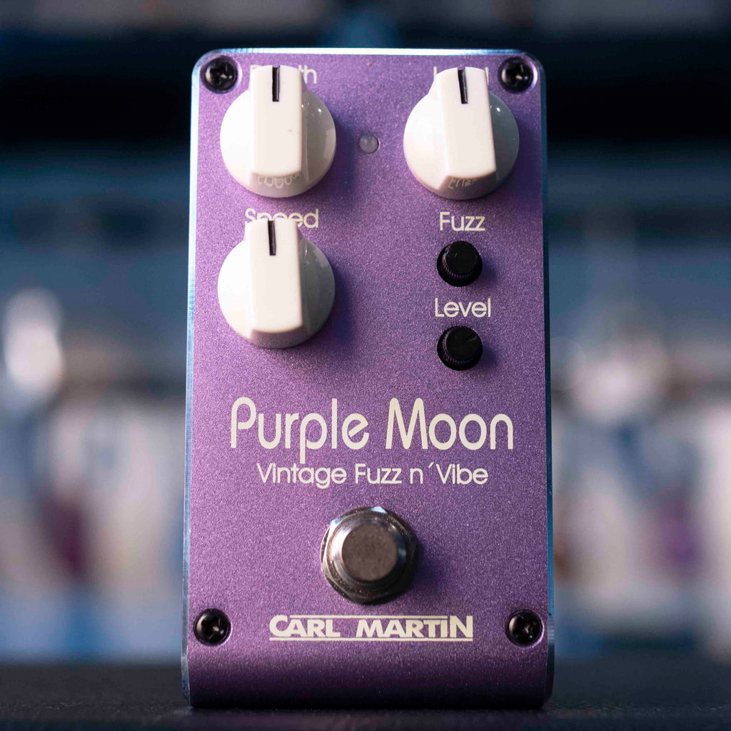 Purple guitar effects pedal with knobs labeled Speed, Fuzz, Level, and a footswitch, branded Carl Martin.
