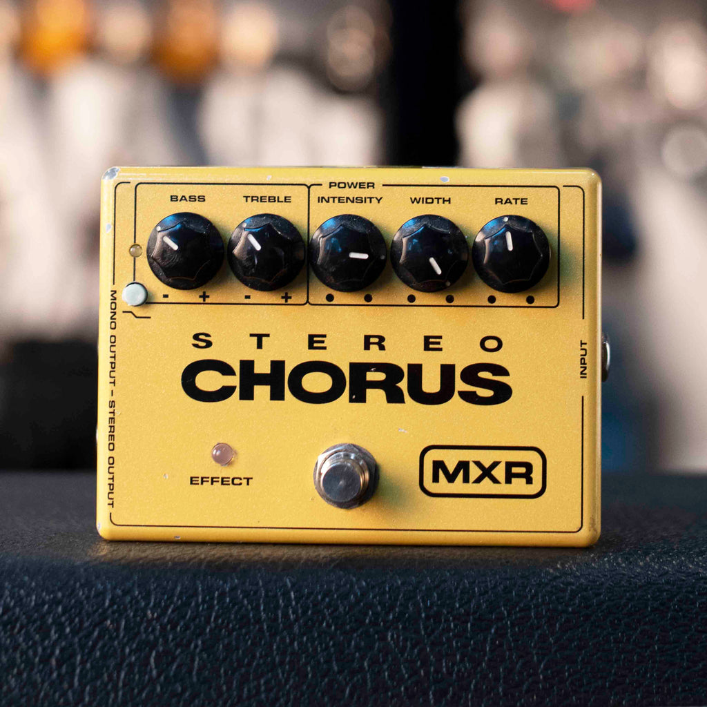 Yellow MXR Stereo Chorus guitar effects pedal with five control knobs and one footswitch.