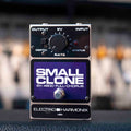 Front view of an Electro-Harmonix Small Clone guitar effects pedal with knob, switch, footswitch, and input/output jacks.