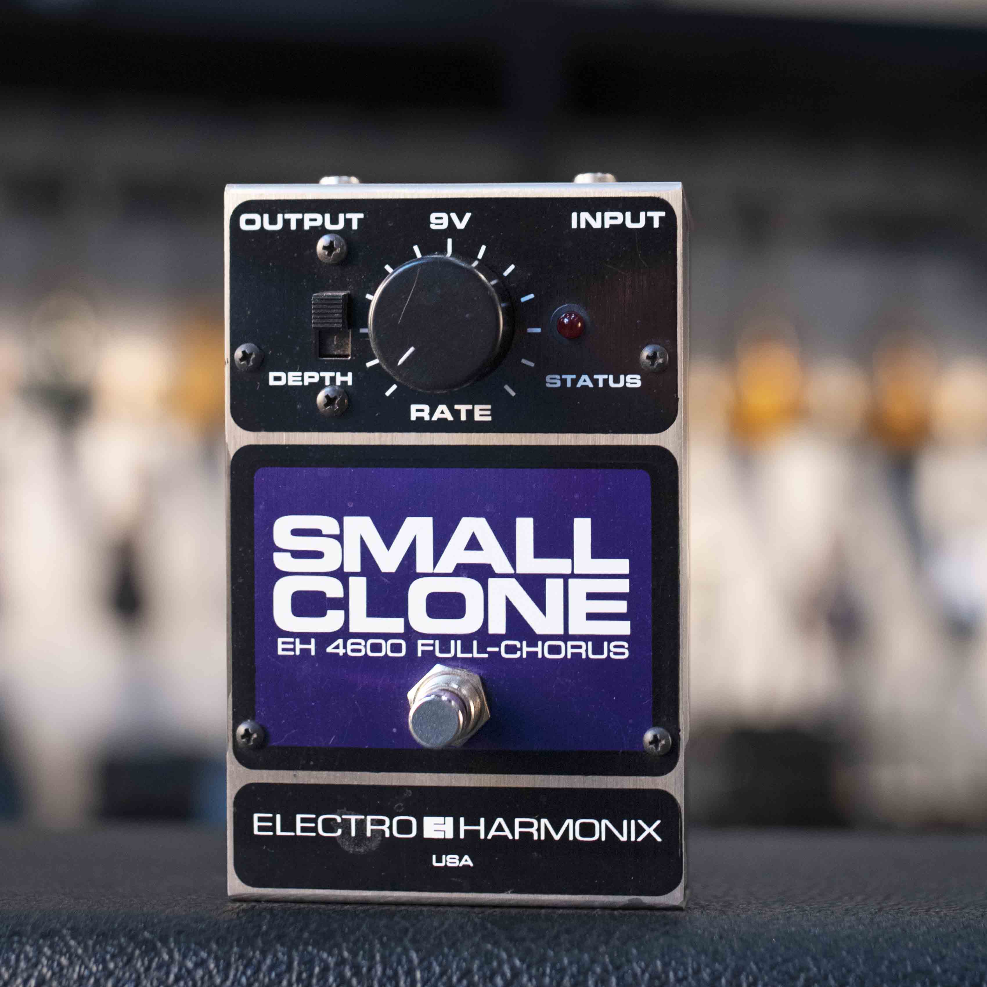 Front view of an Electro-Harmonix Small Clone guitar effects pedal with knob, switch, footswitch, and input/output jacks.