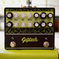 Black and green guitar effects pedal with two footswitches and multiple control knobs for volume, bass, mid, treble, presence, gain, and tight.