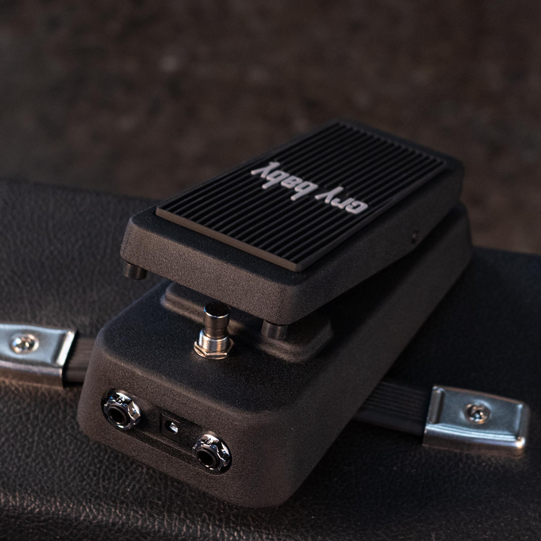 Black guitar pedal labeled Cry Baby with two input/output jacks and a footswitch.