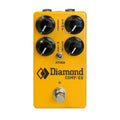Yellow guitar effects pedal with four knobs, one toggle switch, and one footswitch labeled Diamond COMP/EQ.