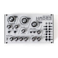 Top view of a Dreadbox Hades analog bass synthesizer with multiple knobs, switches, and patch connectors.