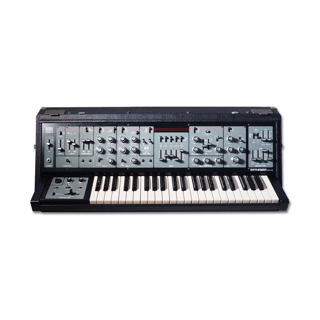 Front view of a Roland synthesizer keyboard with various knobs, faders, switches, and a headphone jack.