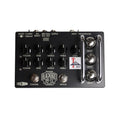 Black guitar preamp pedal with multiple knobs, footswitches, three visible 12AX7 tubes, and various input/output jacks.