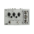 Gray pedal with knobs, tubes, jacks, and footswitches labeled Leveling Amplifier Compressor