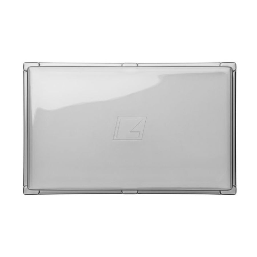 Transparent rectangular plastic cover with rounded corners and a small raised logo in the center.