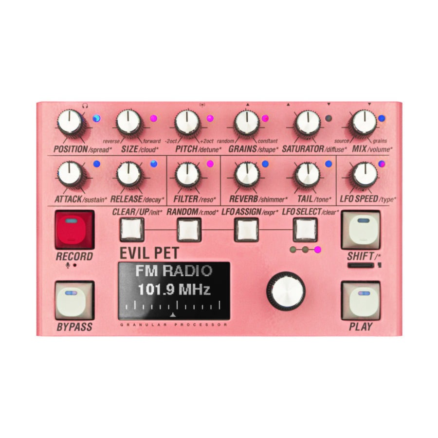 Pink granular processor device with multiple knobs, buttons, and a digital display showing FM RADIO 101.9 MHz.