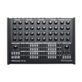 Black electronic device with multiple knobs, buttons, and switches labeled with voice and modulation controls.