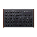 Black synthesizer panel with multiple knobs, switches, and a display screen labeled STEAMPIPE