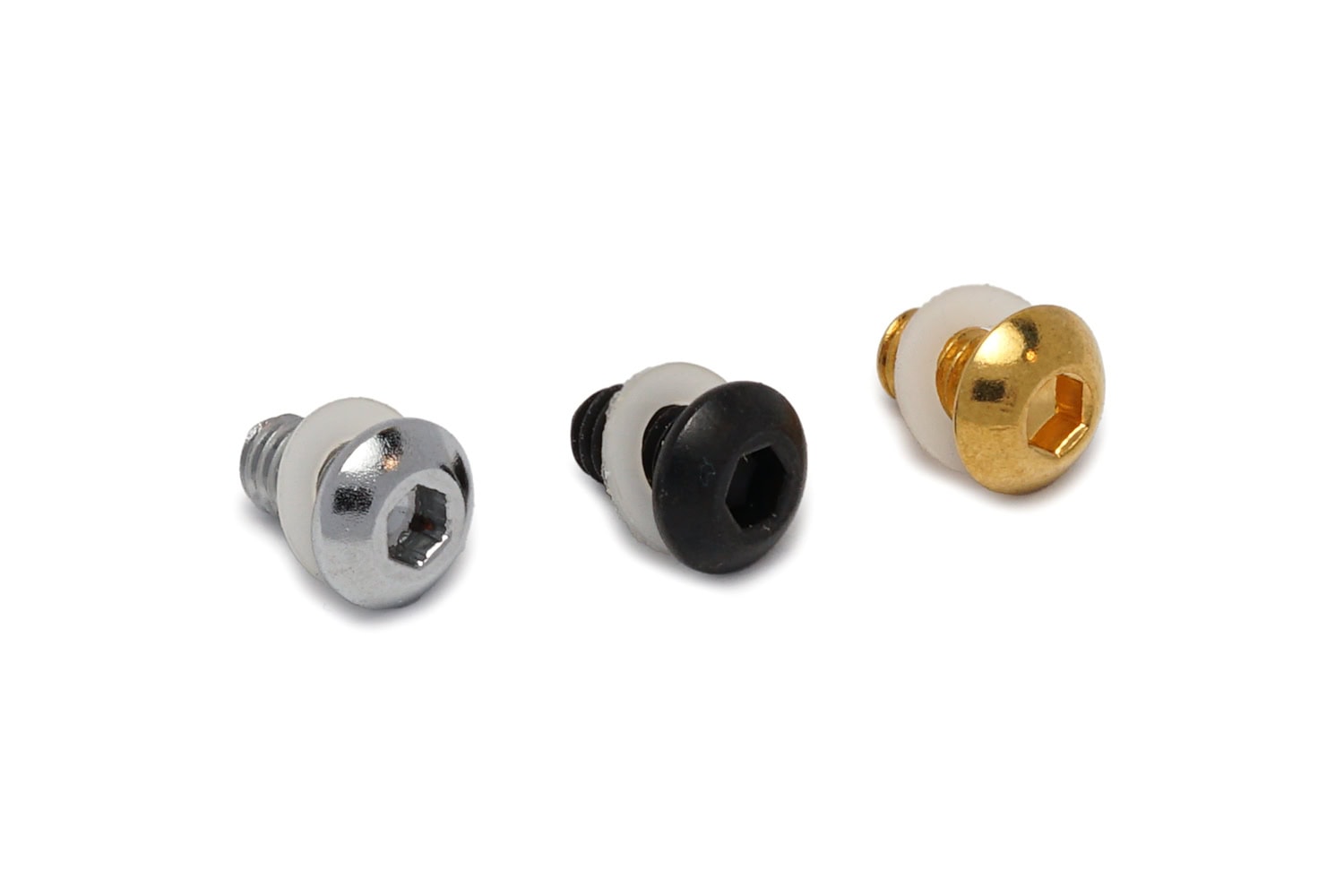 Three hex socket screws with white plastic washers in silver, black, and gold finishes on a white background.