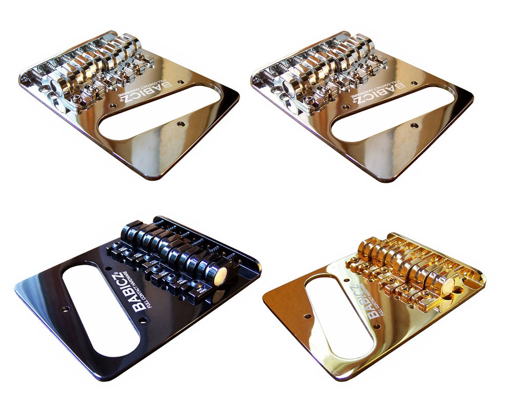 Four Babicz guitar bridges in silver, black, and gold finishes shown from an angled top view.
