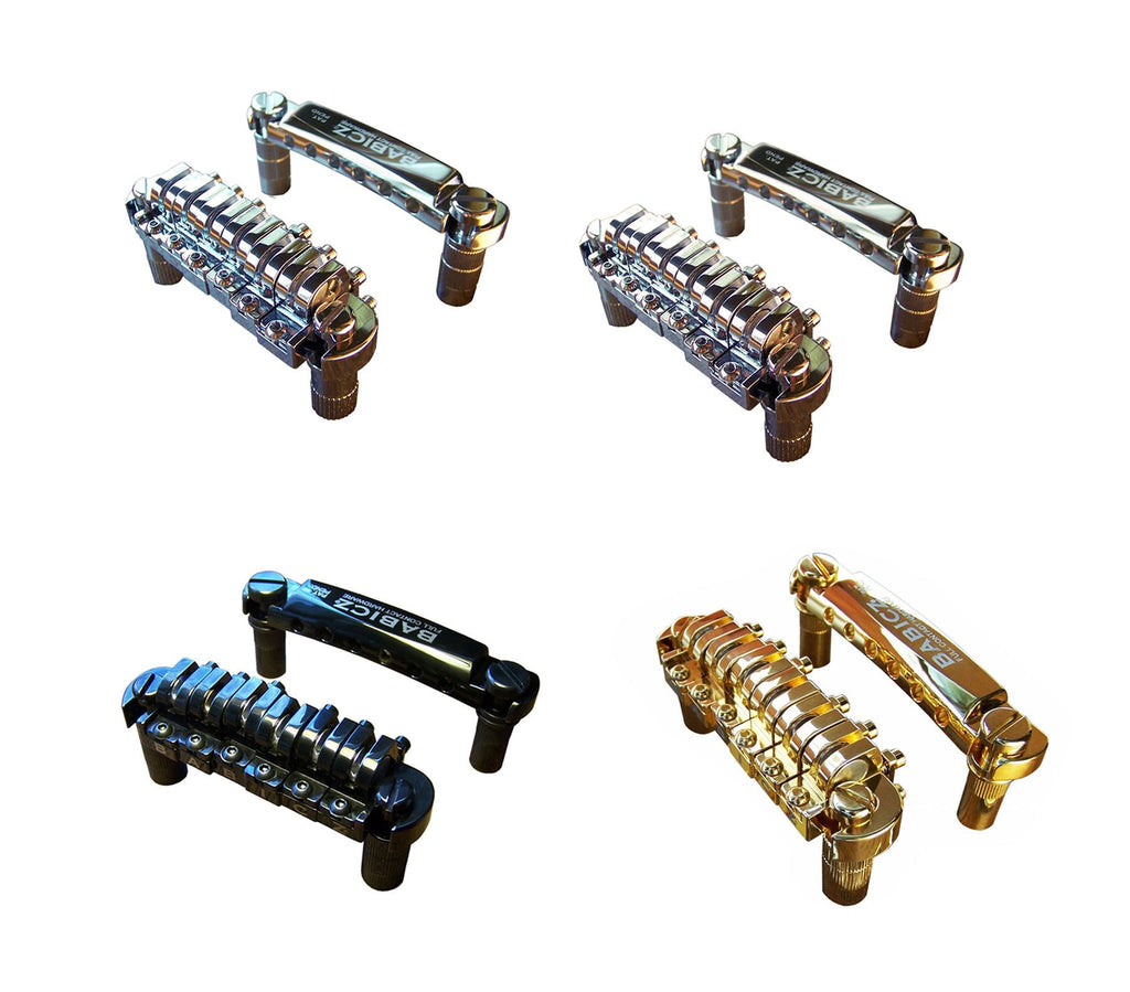 Four sets of metal guitar bridge and tailpiece hardware in silver, black, and gold finishes.