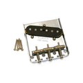 Nickel guitar bridge assembly with black single-coil pickup and adjustment screws, plus loose mounting screws.