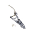 Polished metal guitar tailpiece with lever arm and four screws on a white background