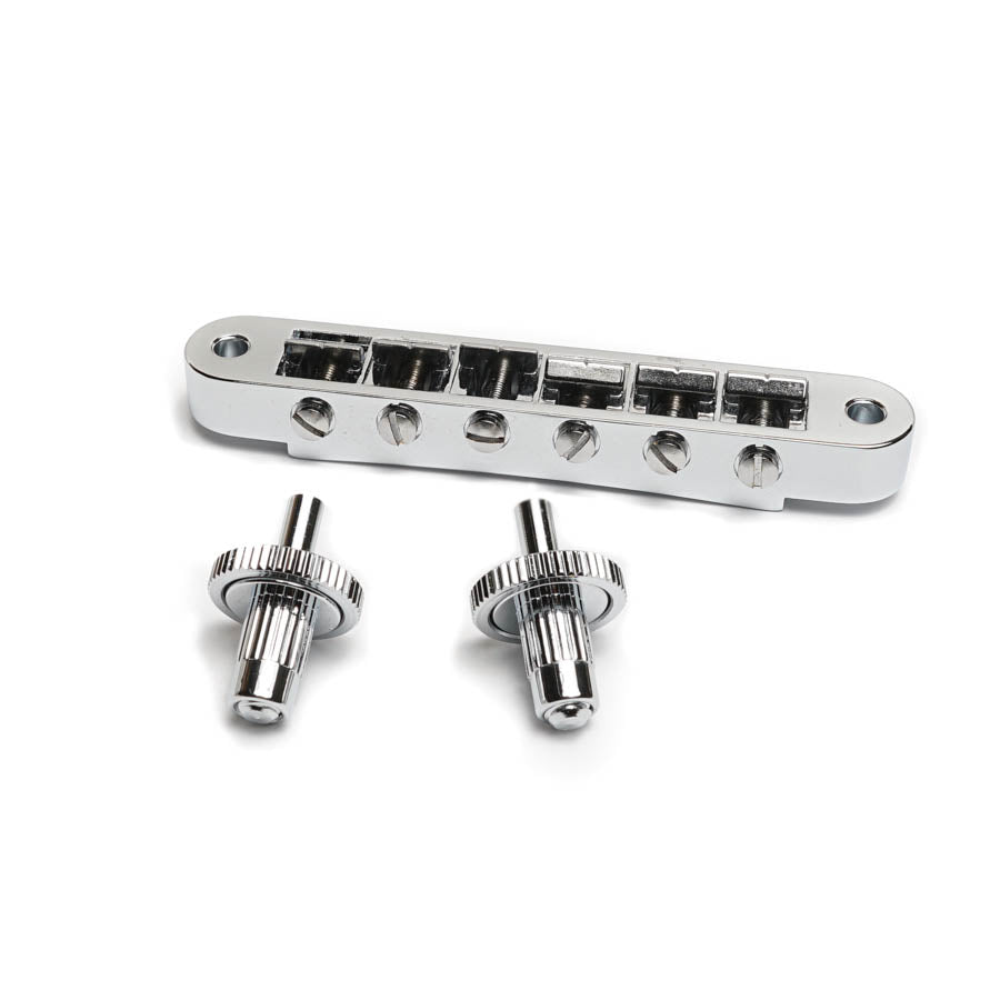 Chrome guitar bridge with six adjustable saddles and two knurled mounting posts on a white background.