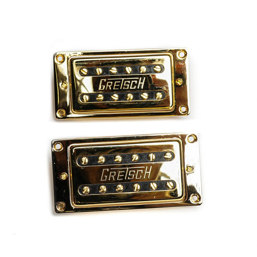 Two gold rectangular guitar pickups with black sections and GRETSCH logo on a white background.
