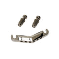 Silver metal stop tailpiece with six holes and two threaded stud posts on a white background.