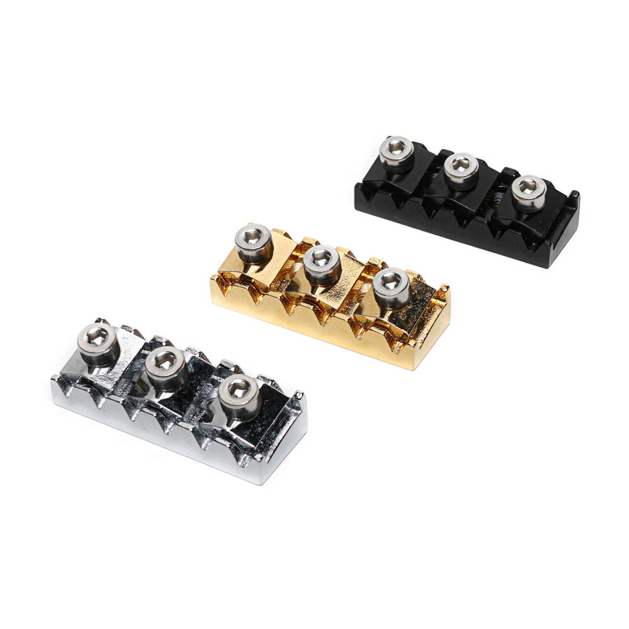 Three small metal clamps with hex screws in black, gold, and silver colors on a white background.