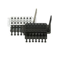 Two Floyd Rose tremolo bridges with attached tremolo arms, one in silver and one in black.