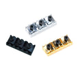 Three rectangular metal nut pieces in gold, silver, and black with three screws each on a white background.