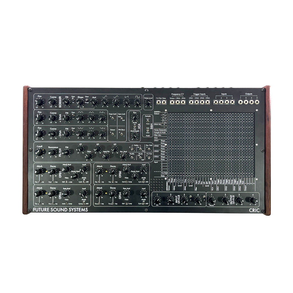 Top-down view of a Future Sound Systems modular synthesizer panel featuring knobs, switches, 1/8 inch jacks, and a matrix patch grid.