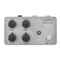 Gray metal guitar effects pedal with four black knobs, two jacks, a footswitch, and labeled controls.
