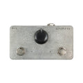 Metal guitar effects pedal with two footswitches and one rotary knob labeled with F/C, M, and L.