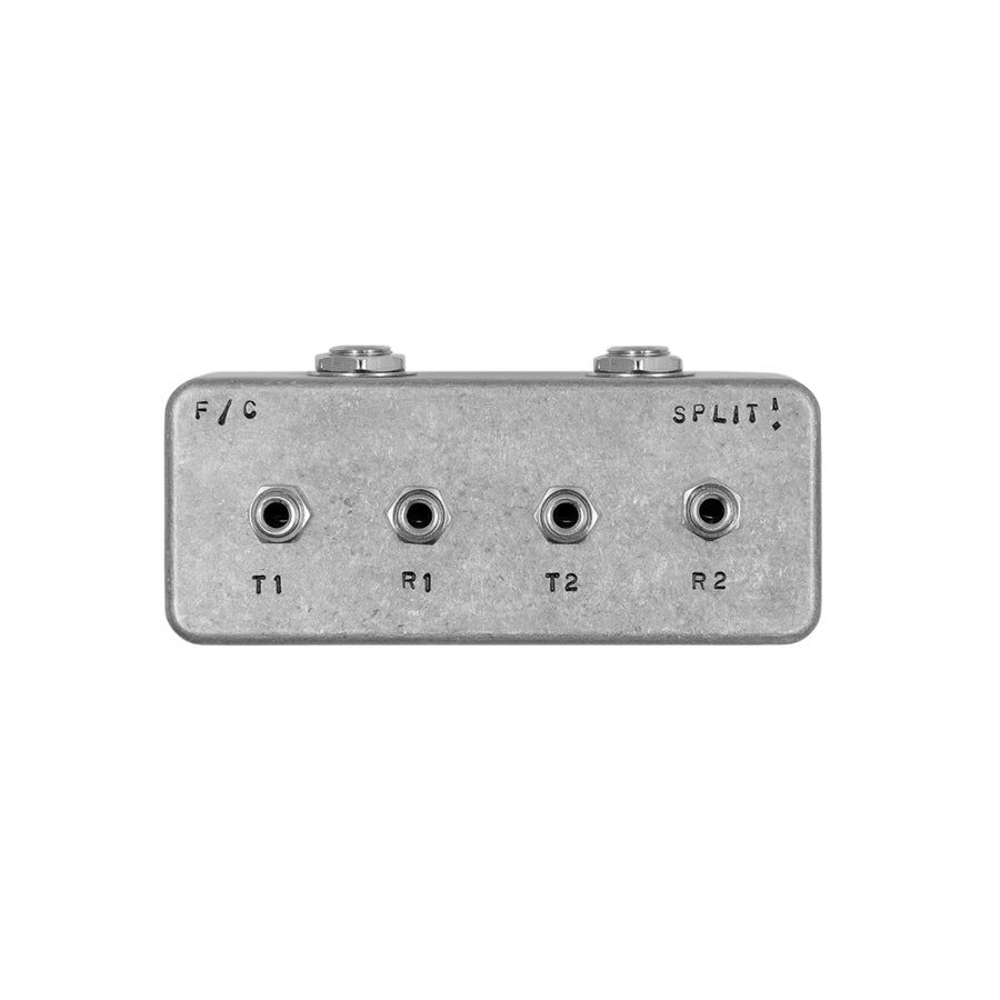 Metal box with four 1/4 inch jacks labeled T1, R1, T2, and R2 and text F/C and SPLIT!
