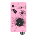 Pink handheld audio device with knobs, toggle switch, and various labeled inputs and outputs.