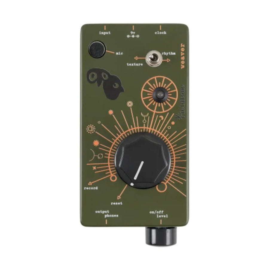 Forest green device with knobs, toggle switch, and various labeled inputs and outputs on its face.