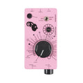 Pink electronic device with two knobs, toggle switch, and a bottom connector labeled with function text and decorative graphics.