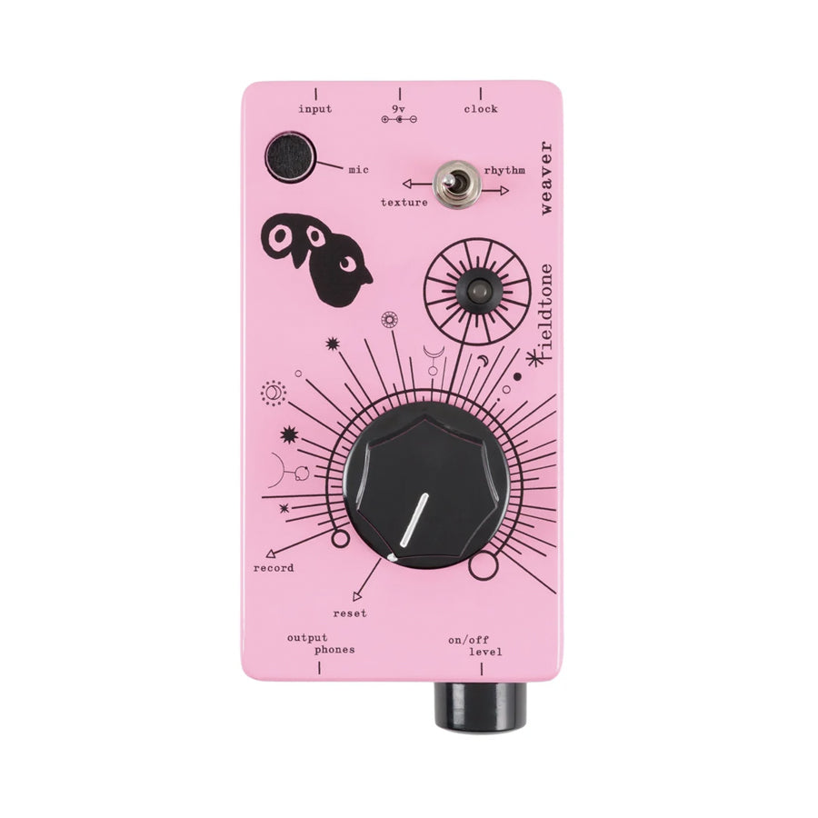 Pink electronic device with two knobs, toggle switch, and a bottom connector labeled with function text and decorative graphics.