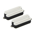Two white electric guitar pickups with black bases shown on a white background.