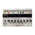 Silver audio sequencer module with multiple knobs, buttons, two displays, and various input/output ports.