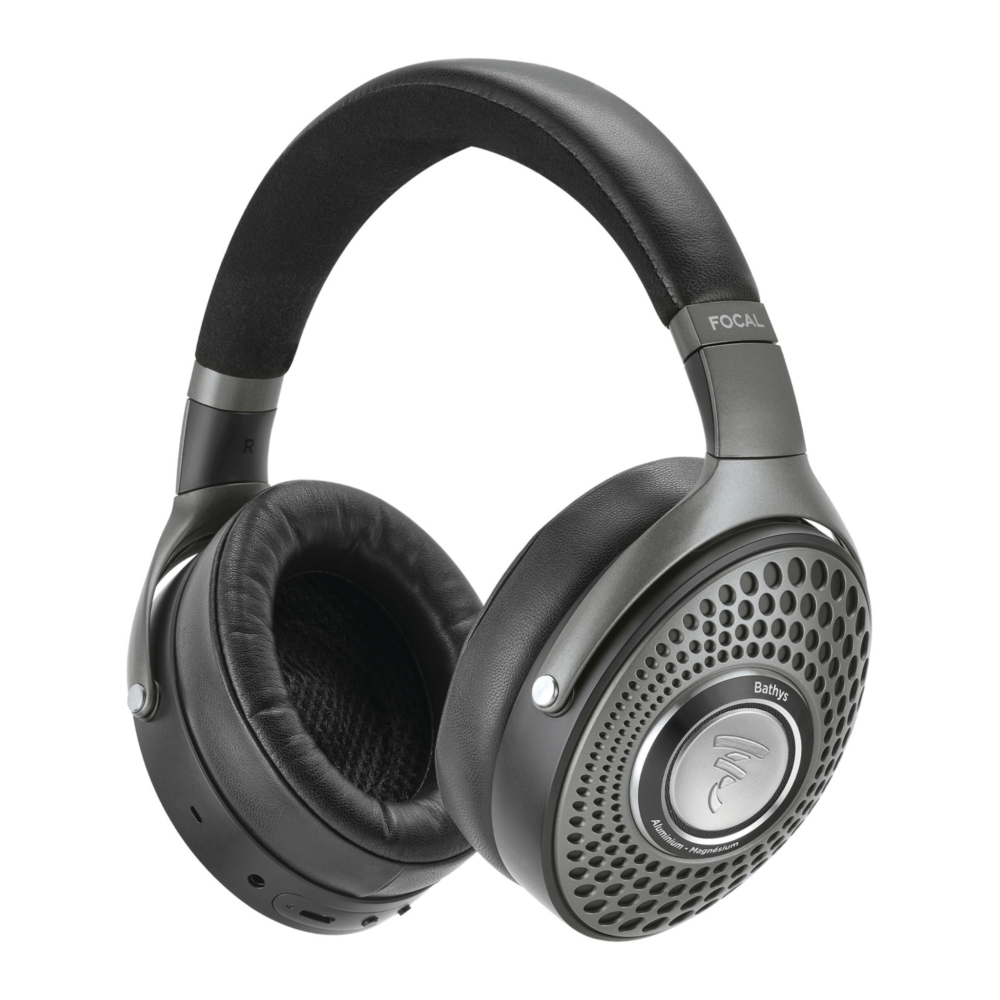 Black and dark gray over-ear headphones with perforated metal earcups and visible control buttons and audio jack.