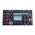 Top view of a black Fred's Lab Manatee 4-part spectral synthesizer with red knobs and a digital display.