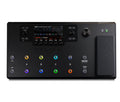 Black multi-effects guitar floor processor with colored footswitches, expression pedal, screen, and multiple control knobs.