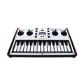 Compact synthesizer with joystick controls, rotary knobs, and a flat keyboard interface with 16 keys.