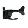 Black metal bass guitar tuner with a wing-shaped tuning key and adjustment knob.