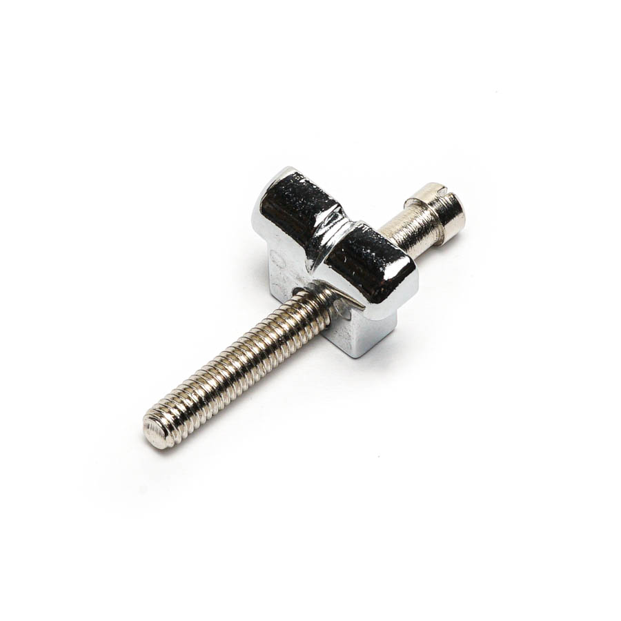 Close-up of a small silver metal bolt with a saddle-like part and a screw adjustment.