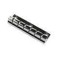 Silver metal guitar bridge tailpiece with six string slots and four mounting holes.