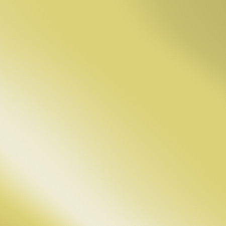 Close-up image of a smooth, reflective gold surface with gradient lighting.