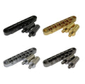 Four guitar bridges with matching large stud posts in black, gold, silver, and gray finishes.