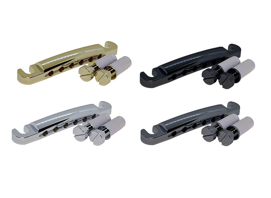 Four guitar tailpieces with mounting posts in gold, black, silver, and grey colors shown on a white background.