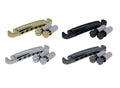 Four guitar tailpieces with mounting posts in gold, black, silver, and grey colors shown on a white background.